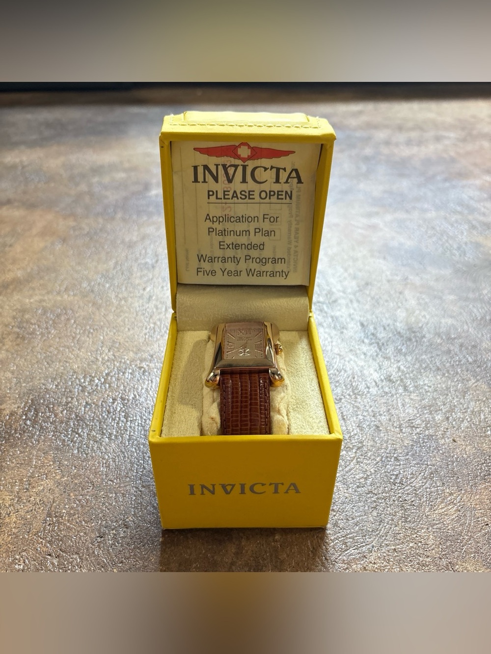 Invicta 11801 men's watch with brown leather strap